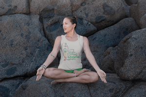 Yogi wearing My Yoga Essentials tank top that reads "Talk to me when all your Chakras are Aligned"