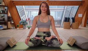 smiling yogi using yoga blocks | My Yoga Essentials